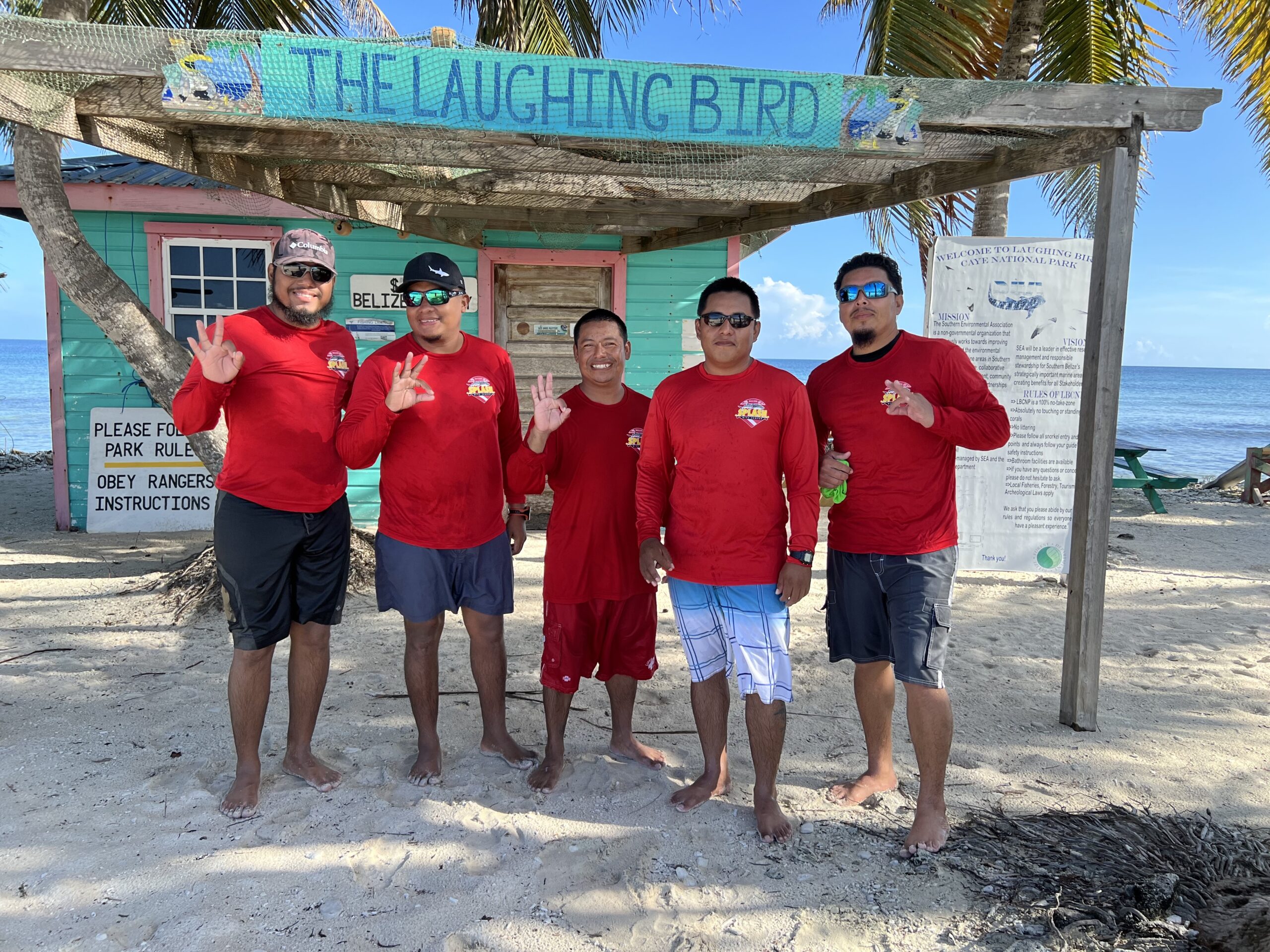 splash dive center team at laughing bird caye placencia belize